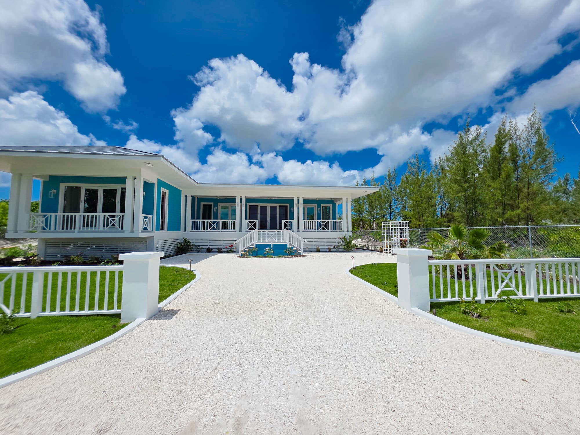 Sandy Toes villa exterior and beach setting